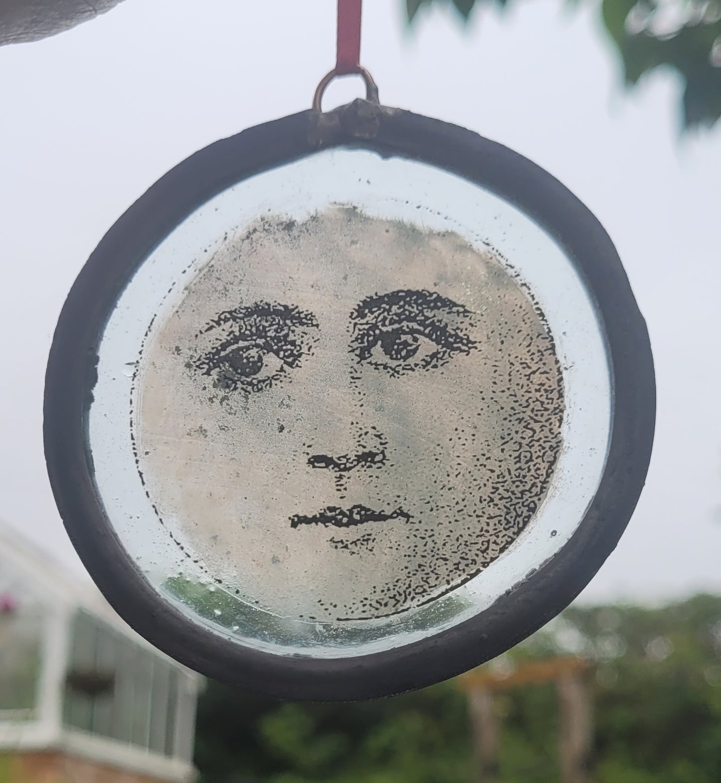 Hanging stained glass moon face panel traditionally made - fantasy art
