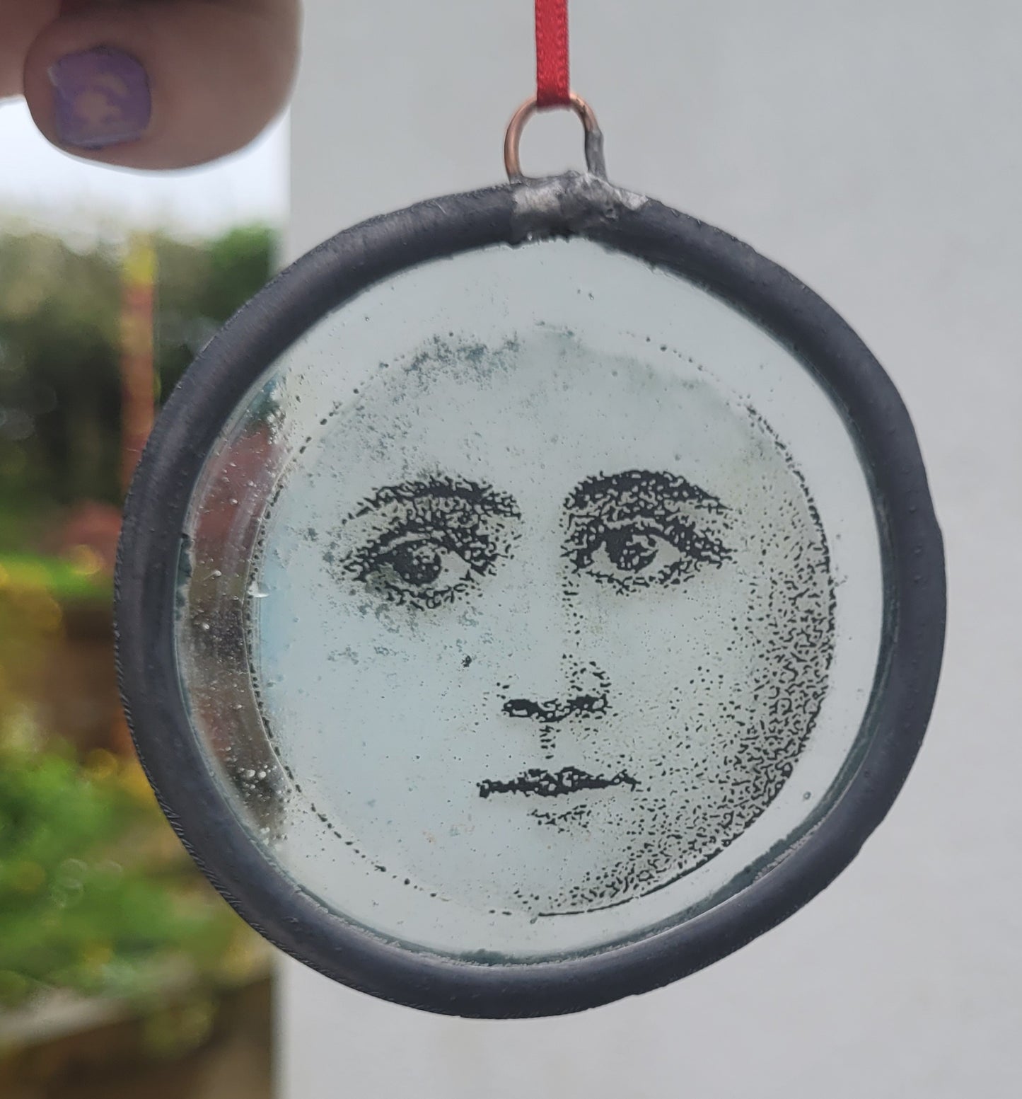 Hanging stained glass moon face panel traditionally made - fantasy art