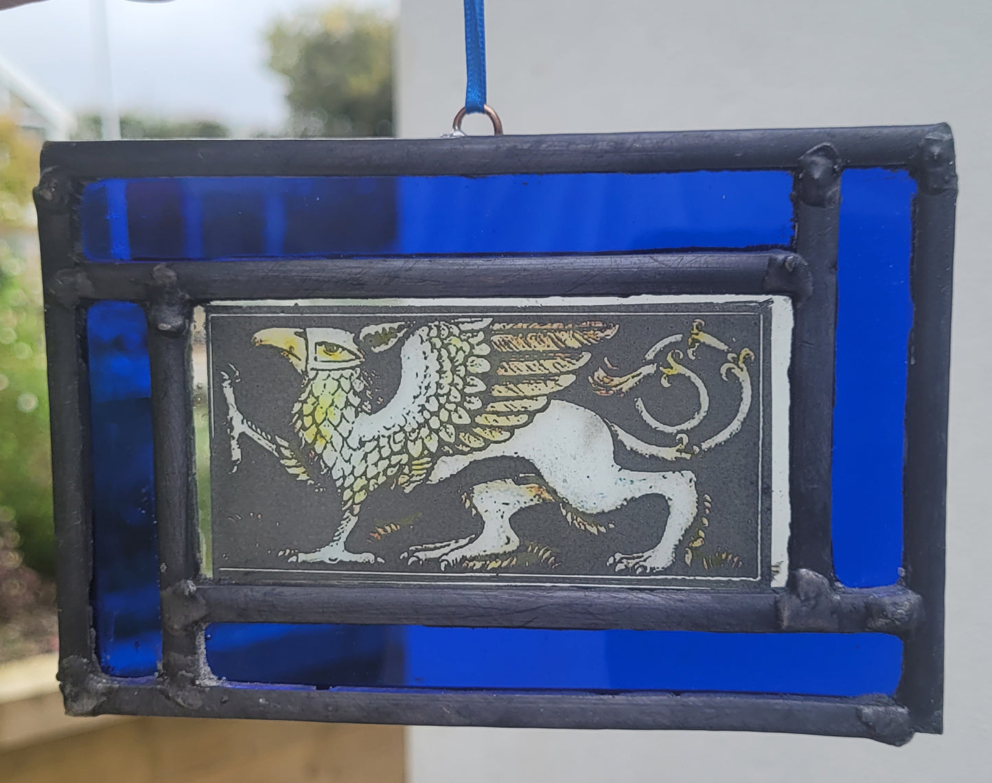 Griffin stained glass panel traditionally made blue border - gryphon fantasy art