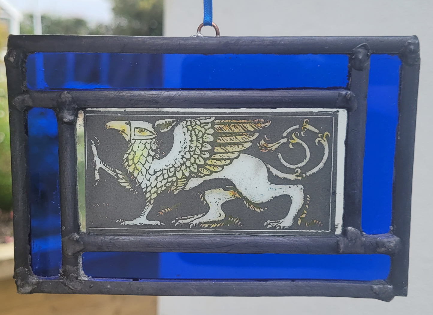Griffin stained glass panel traditionally made blue border - gryphon fantasy art