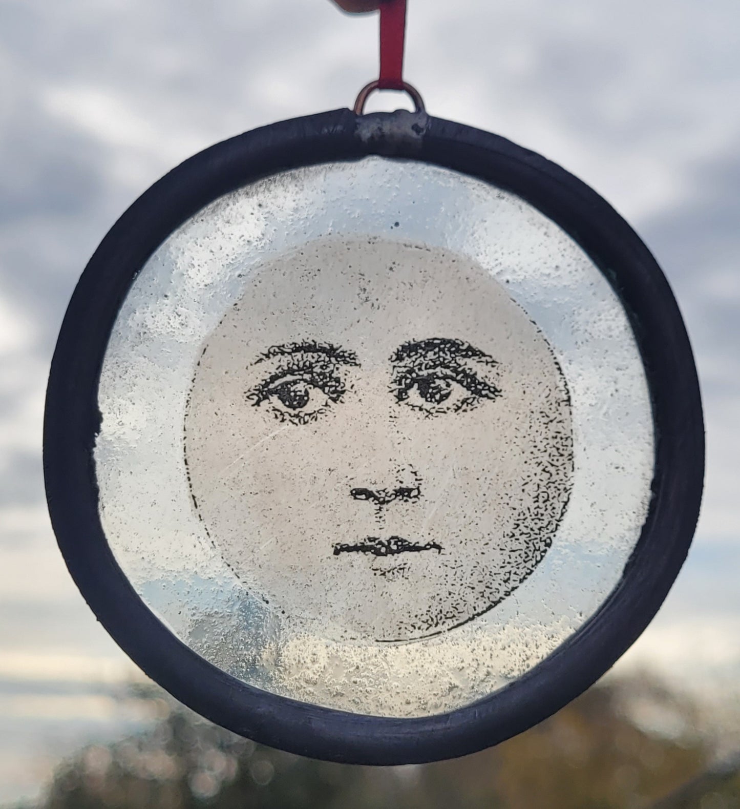Hanging stained glass moon face panel traditionally made -  fantasy art